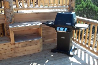barbecue grill and tiled work area