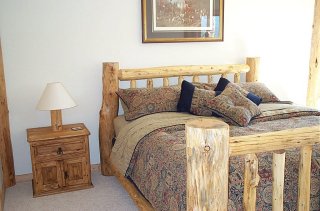 guest bedroom - the bed was made by Ben: Holy Cross Carpentry