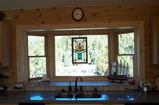 kitchen window with Daly stained glass