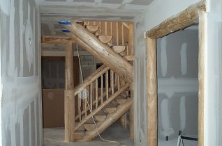 taped drywall, stairs and hallway