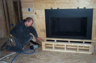 Ben framing the hearth