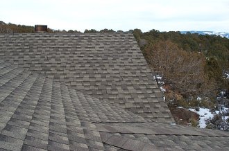 roof shingles are Elk Prestique 35 year Weathered Wood