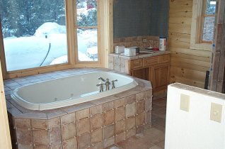 Master Bathroom tiling almost finished