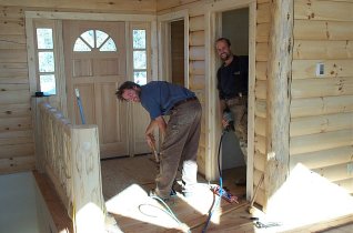 Kevin and Ben laying the pine floor