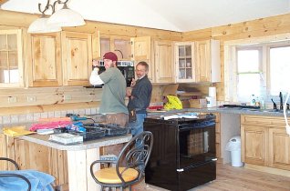 Kevin and me installing the microwave