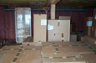 kitchen, laundry and bathroom cabinets stored under the garage