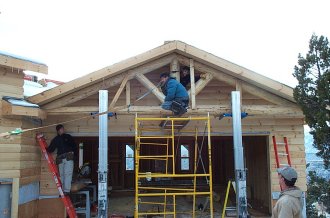 Ben, Mike, Sergio and Steve erecting the garage truss